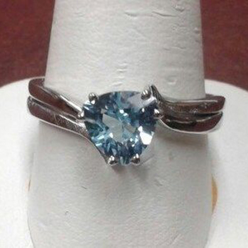photo number one of Blue Topaz Ring item Custom38