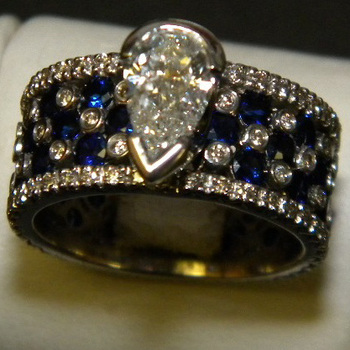 photo number one of Diamond and Sapphire Wide Band Ring item Custom73