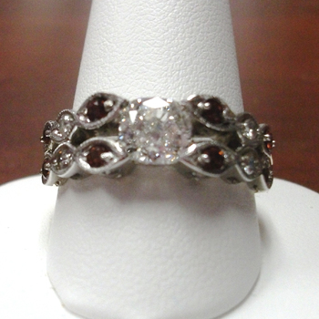 photo number one of Diamond and Garnet Ring item Custom42
