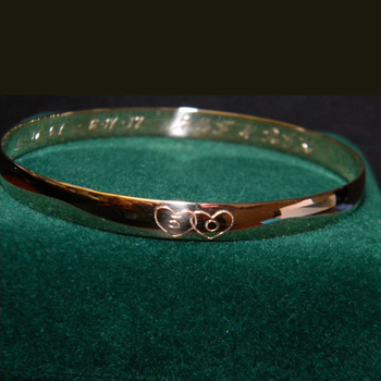 photo number one of Hand Engraved Anniversary Bangle item Custom69