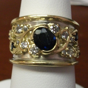 photo number one of Sapphire and Gold Ring item Custom41